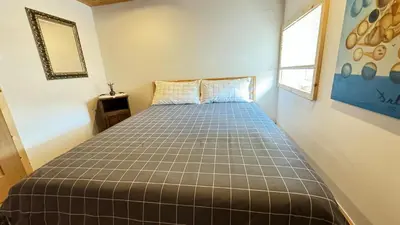 a bedroom with a bed in a room at Hisa Luciano for 5 near Bovec in Bovec