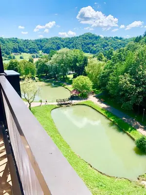 a view of a river from a balcony at Olimian Retreat Rosa 421 in Podčetrtek