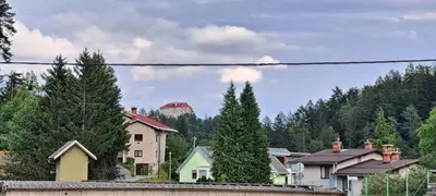 a group of houses in a town with trees at Apartma Bine in Bled