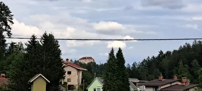 a view of a town with houses and trees at Apartma Bine in Bled
