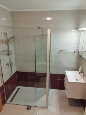 a bathroom with a shower and a sink at Apartma Julia in Spodnje Gorje