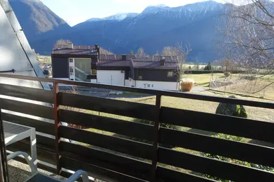 a balcony with a view of a mountain at BovecEnter Apartments Kaninska vas in Bovec