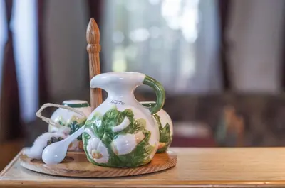 a small vase sitting on a wooden table at Holiday Home Juričko with private Sauna in Bizeljsko
