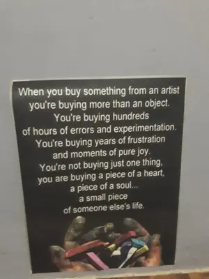 a sign that says when you buy something from an artist youre buying more than at ART ROOM in Rose resort in Ljubljana