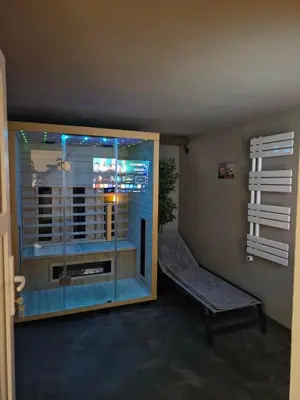 a room with a window and a bench in a room at Orange house Šempeter in Šempeter v Savinjski Dolini