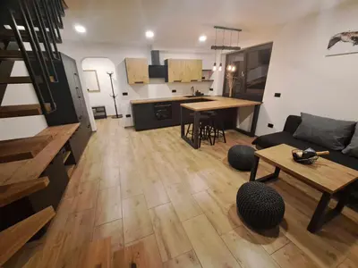 an aerial view of a living room and kitchen at Riverside Apartma 2, Kranjska Gora in Kranjska Gora