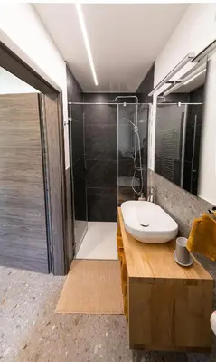 a bathroom with a sink and a shower at Panorama 13 in Tolmin