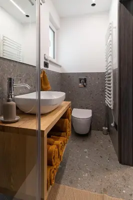 a bathroom with a sink and a toilet at Panorama 13 in Tolmin