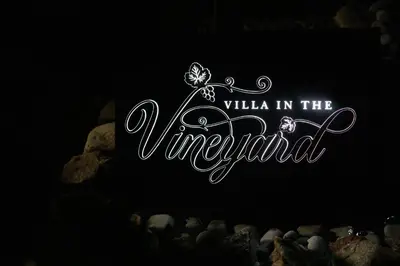 a sign that says villa in the virtual with a butterfly at Villa in the Vineyard with Pool, HotTub & Sauna in Lendava
