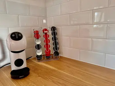 a blender sitting on a counter in a kitchen at Vila Milan in Bled