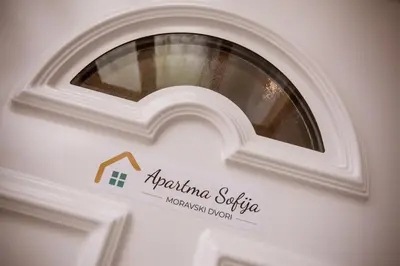 a door with a sign that says argento sicilia microbial program at Apartma Sofija, Moravski Dvori in Moravske Toplice
