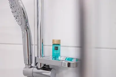a bathroom sink with a toothbrush and a mirror at Apartment MaRI&BoR-No Stairs, Easy Access, Garage optional in Maribor