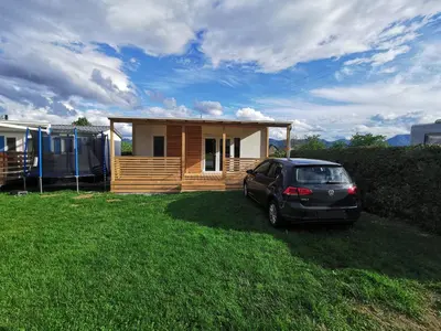 a car parked in front of a small house at Guesthouse Braslovče - Celje in Braslovče