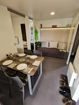 a room with a table and chairs and a couch at Guesthouse Braslovče - Celje in Braslovče