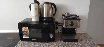 a microwave with a coffee maker and a blender at Hisa jager in Gradišče v Slovenskih Goricah