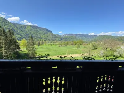 a view from the balcony of the mountains at Nature Hotel Lukanc in Bled