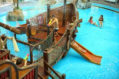 a group of people playing in a water park at Happy Camp Mobile Homes in Camping Terme Čatež in Čatež ob Savi