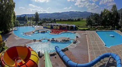 a large water park with two pools and slides at Happy Camp Mobile Homes in Camping Terme Čatež in Čatež ob Savi