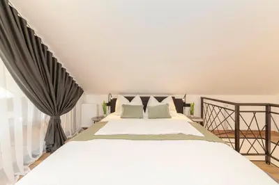 a bedroom with a bed and a window at Naša hiša in Bohinj