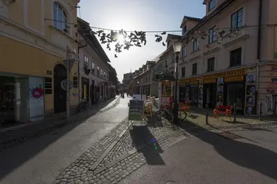 an empty street in a city with buildings at Studio in Ljubljana Center in Ljubljana