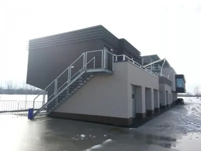 a building with a staircase on the side of it at Adrenalina in Krško