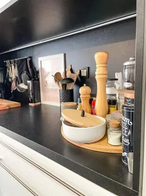 a counter top with a bowl and other kitchen items at Apartment *MALA* in Žalec