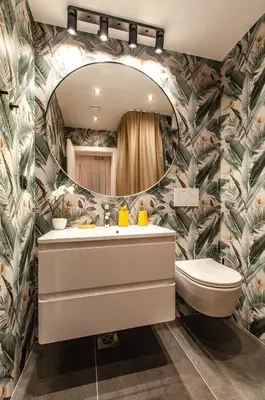 a bathroom with a sink and a mirror at SIX IN THE CITY Apartment, LJUBLJANA in Ljubljana