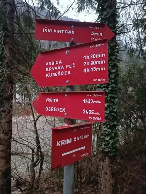 a street sign with many red signs on it at Riverside Guesthouse in Ig