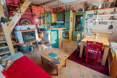 an overhead view of a living room with a kitchen at Chalet Alpinka in Cerklje na Gorenjskem