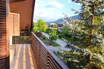 a balcony of a house with a view of a street at Apartment Galerija in Radovljica