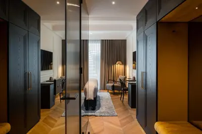 a room with a hallway with a living room at AS Boutique Hotel, superior in Ljubljana