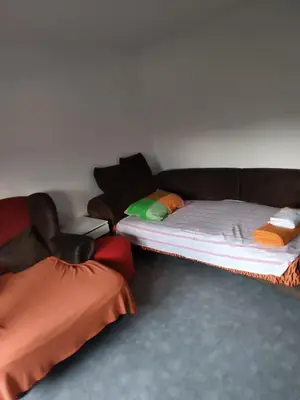 two bunk beds in a room with a couch at Apartma Dobrodošli pri Renati v Celju in Celje