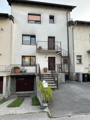 an apartment building with stairs and a balcony at Spacious APT in a Quiet Neighbourhood + Private Parking in Ljubljana