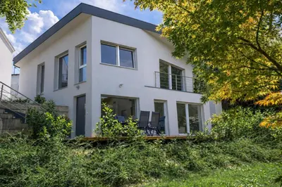 an image of a white house at Jacobs Legacy - 4 Bedroom House, Free Parking, near City Center in Ljubljana