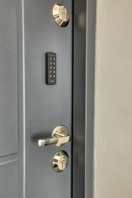 a door with a door knob and a control panel at Dragon Residence in Ljubljana