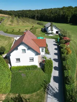 an overhead view of a white house with a driveway at POD OREHI - Hiša na podeželju - RAZPRŠENI HOTEL Jeruzalem Slovenija in Miklavž pri Ormožu