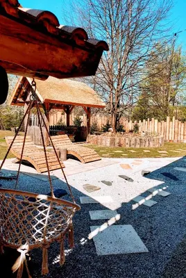 a playground with a gazebo in a park at Koča na samem in Moravske Toplice