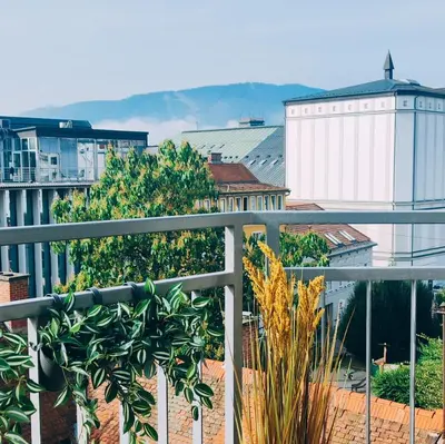 a view of a city from a balcony at Panoramic LOFT in the CityCenter in Maribor