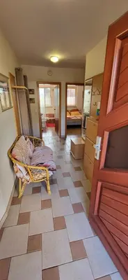 a living room with a room with a floor at Apartma Ob Krki in Straža