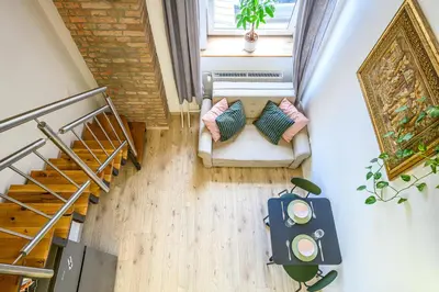 an overhead view of a living room with a couch at The Lovely Loft in Ljubljana