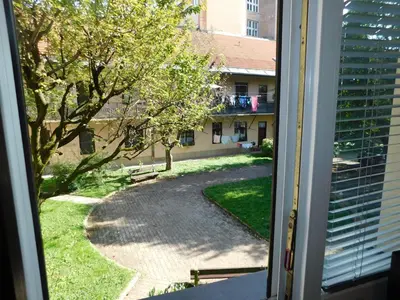 a view from a window of a walkway at Modern Apartment Hrenova Street in Ljubljana