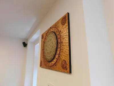a picture hanging on a wall in a room at Modern Apartment Hrenova Street in Ljubljana