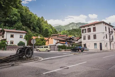 a street with cars parked on the side of the road at Studio Mobile Home Gotar in Kobarid