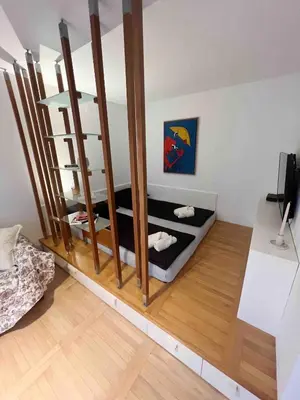 a room with a room with a staircase in it at Comfy flat in city-FREE parking in Ljubljana