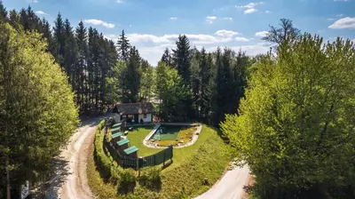 an aerial view of a house in the middle of a road at Pomona Relaxing Nature Guest House in Rogaška Slatina