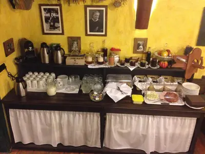 a table with food on top of it at Pomona Relaxing Nature Guest House in Rogaška Slatina