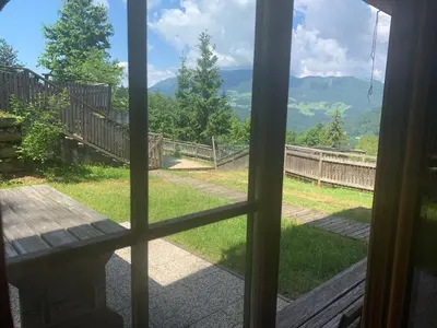 a view from a window of a yard at A View to a Hill in Sveti Florijan pri Šoštanju