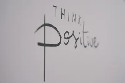 a sign with the words think bigger at Hisa idej in Sežana