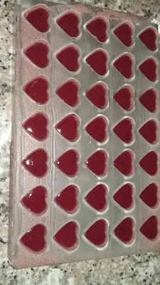 a metal pan with red food on top at Guest House Tara in Moravske Toplice