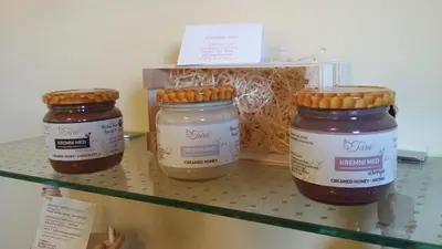 three jars of jam on a shelf in a refrigerator at Guest House Tara in Moravske Toplice